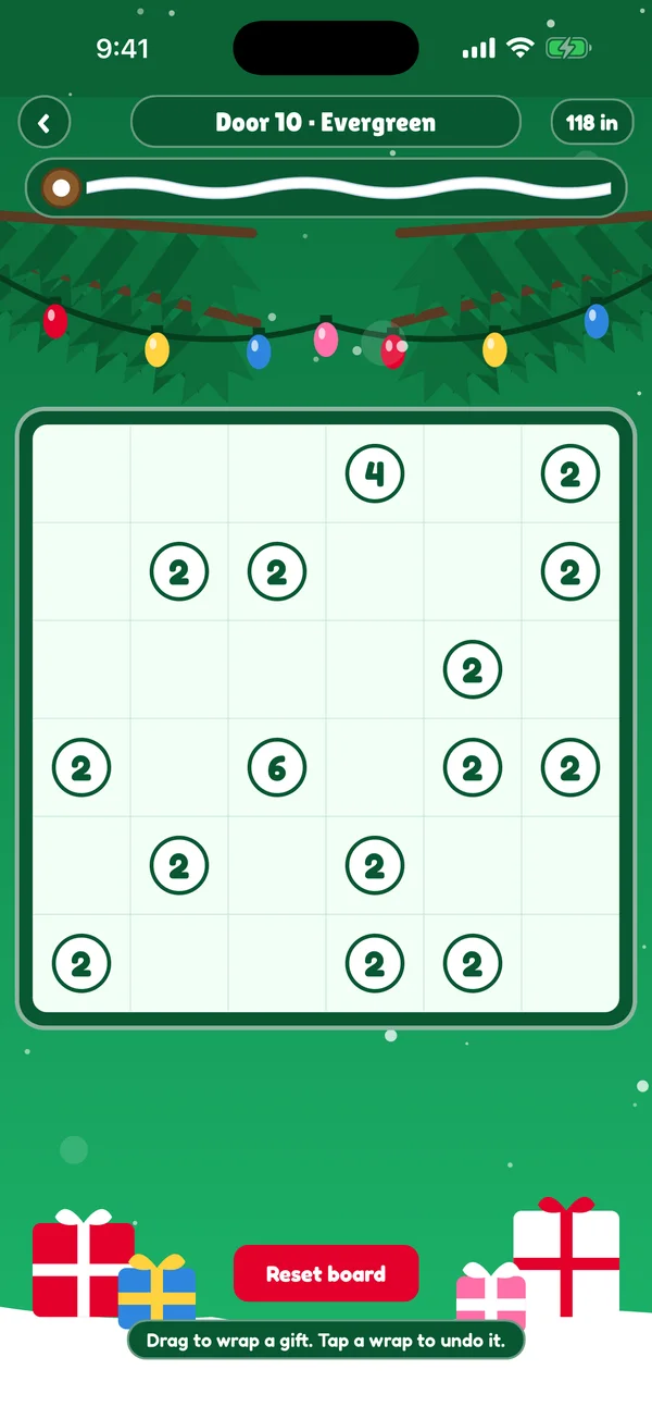 MerryWrap Door 10, Evergreen board with a ribbon spool