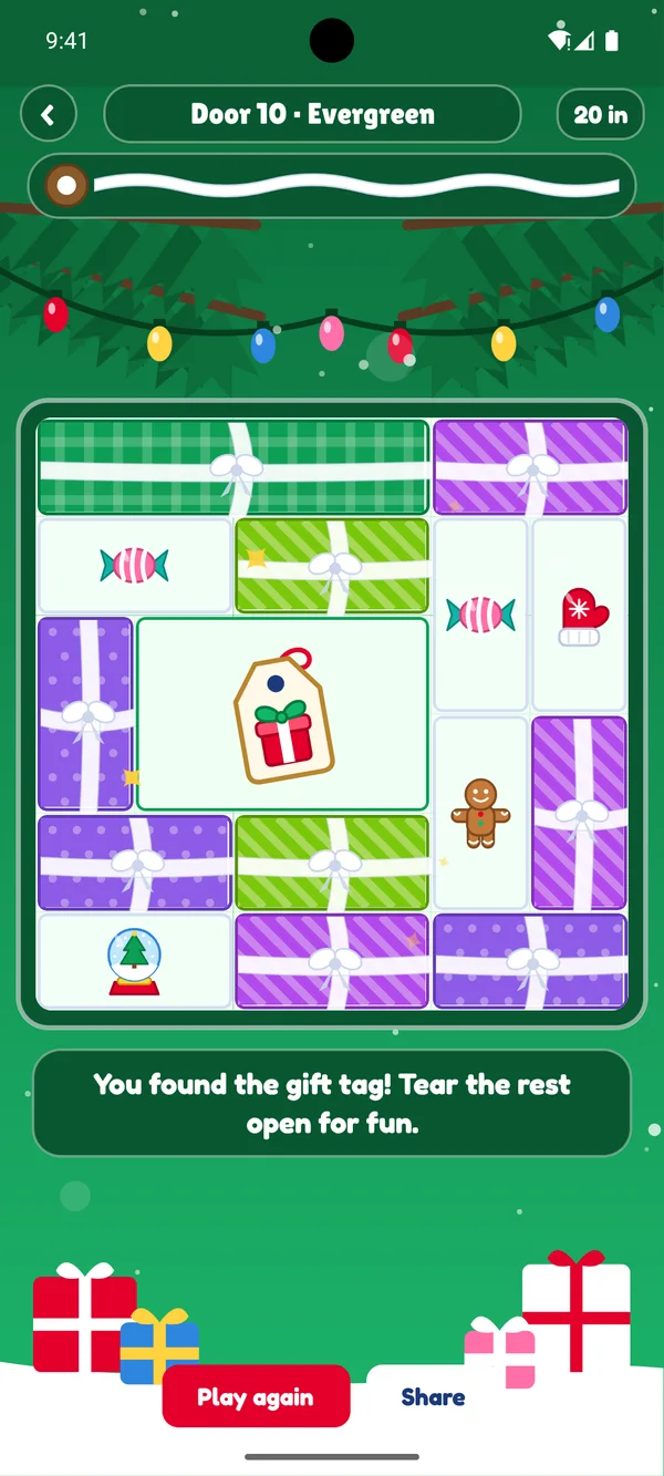 MerryWrap Door 10, Evergreen: the gifts are torn open and the gift tag has been found